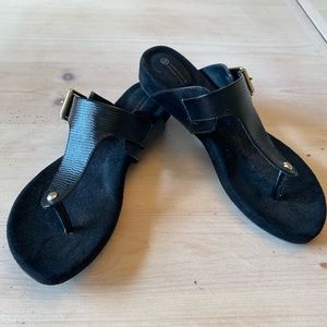 Black sandals.